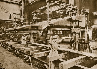 Women workers at a heavy metal armament factory by English Photographer